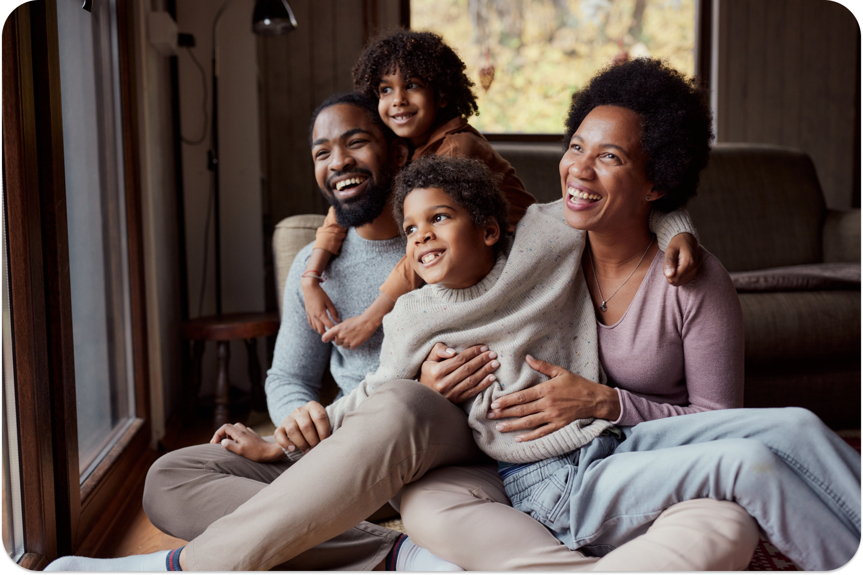 Happy African American family of four